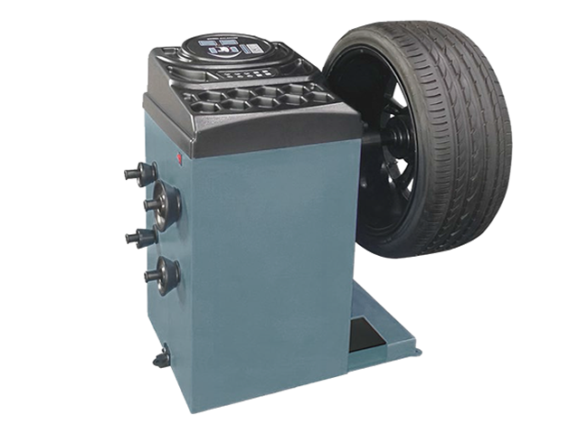 Hand spun passenger wheel balancer